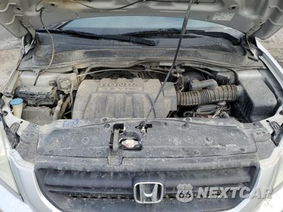 Zdjęcie 12 z 13 samochodu: 2005 HONDA PILOT EXL VIN:2HKYF18715H560693 - miniatura