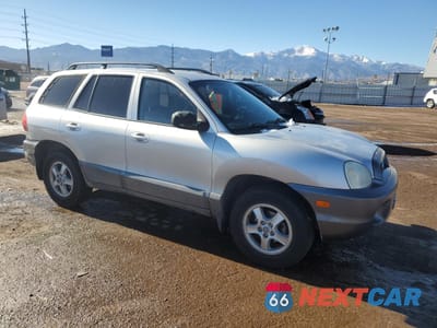 Czwarte zdjęcie samochodu z boku: 2003 HYUNDAI SANTA FE GL VIN:KM8SB12B43U384302 - miniatura