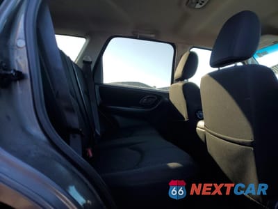 Zdjęcie 11 z 14 samochodu: 2005 MAZDA TRIBUTE S VIN:4F2YZ941X5KM52100 - miniatura