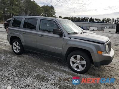 Czwarte zdjęcie samochodu z boku: 2014 JEEP PATRIOT LATITUDE VIN:1C4NJPFA4ED619678 - miniatura
