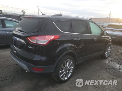 Trzecie zdjęcie samochodu z tyłu: 2016 FORD ESCAPE SE VIN:1FMCU9GX9GUA58616 - miniatura