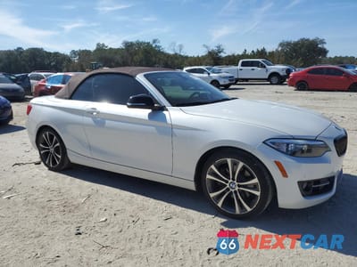Czwarte zdjęcie samochodu z boku: 2015 BMW 228 I VIN:WBA1K5C51FV474082 - miniatura