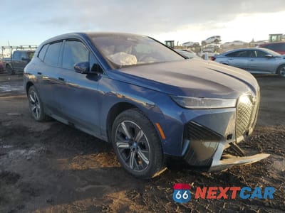 Czwarte zdjęcie samochodu z boku: 2024 BMW IX XDRIVE50 VIN:WB523CF08RCP39620 - miniatura