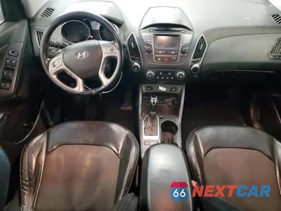 Zdjęcie 8 z 13 samochodu: 2014 HYUNDAI TUCSON GLS VIN:KM8JUCAG2EU828035 - miniatura