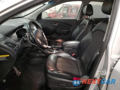 Zdjęcie 7 z 13 samochodu: 2014 HYUNDAI TUCSON GLS VIN:KM8JUCAG2EU828035 - miniatura