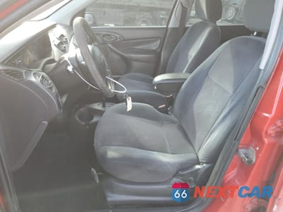 Zdjęcie 7 z 14 samochodu: 2000 FORD FOCUS SE VIN:1FAFP34P8YW289920 - miniatura