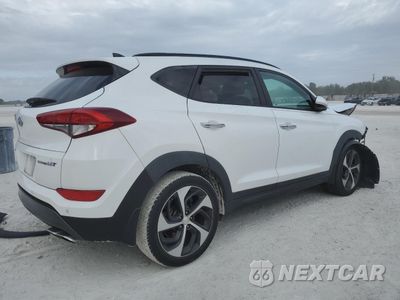 Trzecie zdjęcie samochodu z tyłu: 2016 HYUNDAI TUCSON LIMITED VIN:KM8J33A25GU161682 - miniatura