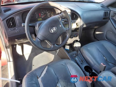 Zdjęcie 8 z 14 samochodu: 2004 HYUNDAI ELANTRA GLS VIN:KMHDN46D04U737438 - miniatura