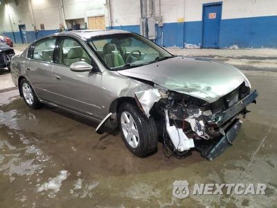 Czwarte zdjęcie samochodu z boku: 2002 NISSAN ALTIMA BASE VIN:1N4AL11E12C701097 - miniatura