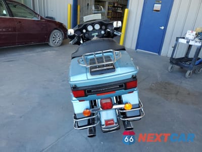 Czwarte zdjęcie samochodu z boku: 2008 HARLEY-DAVIDSON FLHTCUI VIN:1HD1FC4118Y634341 - miniatura