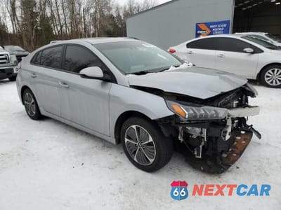Czwarte zdjęcie samochodu z boku: 2021 HYUNDAI IONIQ SE VIN:KMHC65LD9MU261287 - miniatura