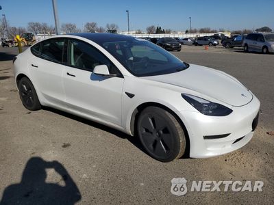 Czwarte zdjęcie samochodu z boku: 2023 TESLA MODEL 3 VIN:5YJ3E1EA1PF708470 - miniatura
