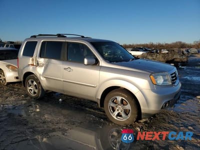 Czwarte zdjęcie samochodu z boku: 2012 HONDA PILOT VIN:5FNYF4H4XCB022206 - miniatura