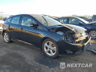 Czwarte zdjęcie samochodu z boku: 2014 FORD FOCUS SE VIN:1FADP3K21EL274607 - miniatura