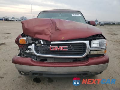 Piąte zdjęcie samochodu w środku: 2002 GMC YUKON VIN:1GKEC13T02R245117 - miniatura
