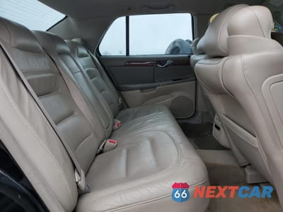 Zdjęcie 10 z 13 samochodu: 2003 CADILLAC DEVILLE VIN:1G6KD54Y03U212407 - miniatura