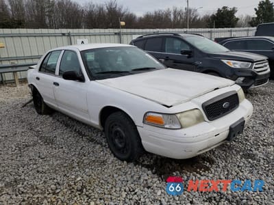 Czwarte zdjęcie samochodu z boku: 2011 FORD CROWN VICTORIA POLICE INTERCEPTOR VIN:2FABP7BV6BX125701 - miniatura