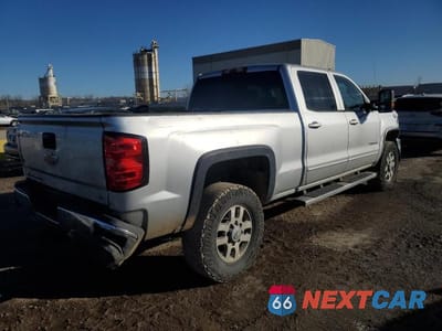 Trzecie zdjęcie samochodu z tyłu: 2015 CHEVROLET SILVERADO K2500 HEAVY DUTY LT VIN:1GC1KVE89FF569882 - miniatura