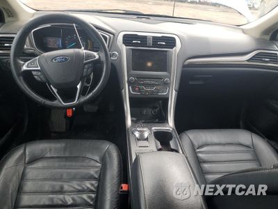 Zdjęcie 8 z 12 samochodu: 2017 FORD FUSION SE HYBRID VIN:3FA6P0LU3HR409681 - miniatura