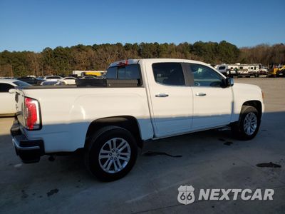 Trzecie zdjęcie samochodu z tyłu: 2016 GMC CANYON SLT VIN:1GTG5DE38G1360034 - miniatura