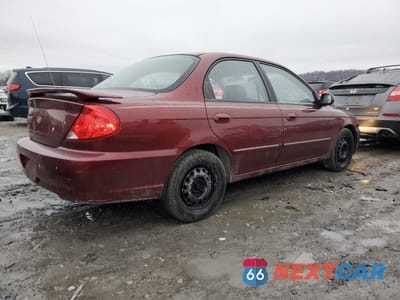 Trzecie zdjęcie samochodu z tyłu: 2003 KIA SPECTRA BASE VIN:KNAFB121335215523 - miniatura