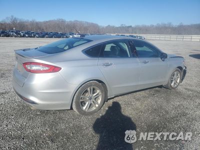 Trzecie zdjęcie samochodu z tyłu: 2016 FORD FUSION TITANIUM HEV VIN:3FA6P0RU5GR349697 - miniatura