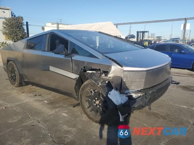 Czwarte zdjęcie samochodu z boku: 2024 TESLA CYBERTRUCK VIN:7G2CEHED7RA035023 - miniatura