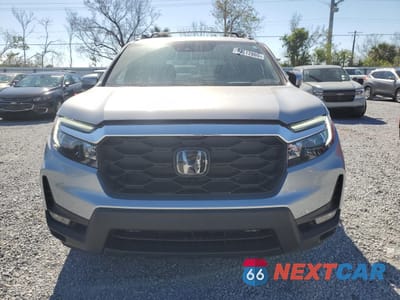 Piąte zdjęcie samochodu w środku: 2023 HONDA PASSPORT EXL VIN:5FNYF8H54PB040111 - miniatura