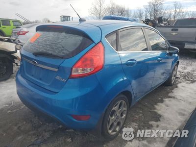 Trzecie zdjęcie samochodu z tyłu: 2012 FORD FIESTA SES VIN:3FADP4FJ5CM156353 - miniatura