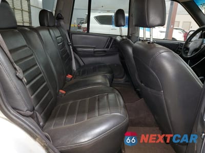 Zdjęcie 12 z 15 samochodu: 1996 JEEP GRAND CHEROKEE LAREDO VIN:1J4GZ58Y2TC203321 - miniatura