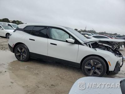 Czwarte zdjęcie samochodu z boku: 2025 BMW IX XDRIVE50 VIN:WB523CF03SCT45934 - miniatura