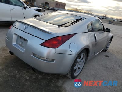 Trzecie zdjęcie samochodu z tyłu: 2003 NISSAN 350Z COUPE VIN:JN1AZ34E73T009799 - miniatura