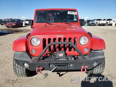 Piąte zdjęcie samochodu w środku: 2015 JEEP WRANGLER UNLIMITED SAHARA VIN:1C4BJWEGXFL589760 - miniatura