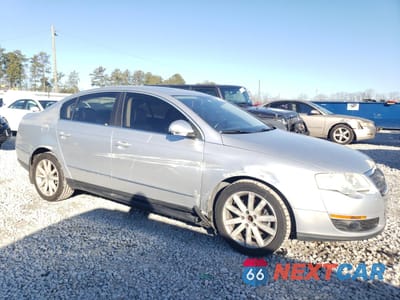 Czwarte zdjęcie samochodu z boku: 2010 VOLKSWAGEN PASSAT KOMFORT VIN:WVWJK7AN2AE139634 - miniatura