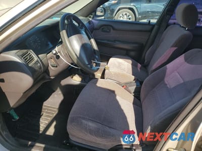 Zdjęcie 7 z 12 samochodu: 1995 TOYOTA COROLLA LE VIN:1NXAE09B2SZ329302 - miniatura