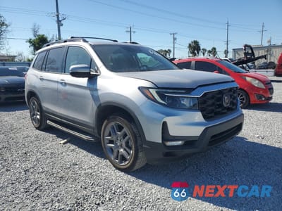 Czwarte zdjęcie samochodu z boku: 2023 HONDA PASSPORT EXL VIN:5FNYF8H54PB040111 - miniatura