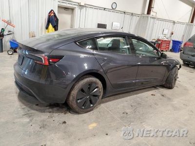 Trzecie zdjęcie samochodu z tyłu: 2024 TESLA MODEL 3 VIN:5YJ3E1EA0RF771496 - miniatura
