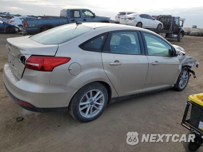 Trzecie zdjęcie samochodu z tyłu: 2018 FORD FOCUS SE VIN:1FADP3FE4JL278116 - miniatura