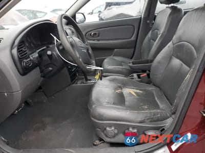 Zdjęcie 7 z 12 samochodu: 2003 KIA SPECTRA BASE VIN:KNAFB121335215523 - miniatura