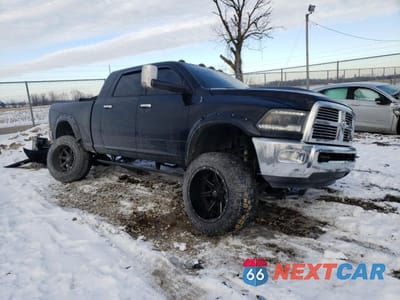Czwarte zdjęcie samochodu z boku: 2012 DODGE RAM 2500 LARAMIE VIN:3C6UD5NL1CG222396 - miniatura