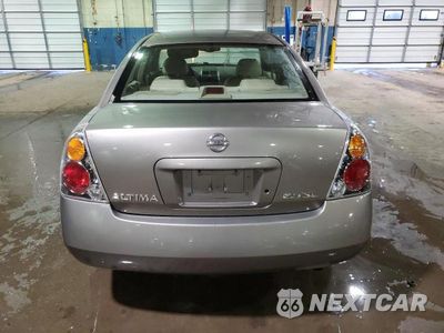 Zdjęcie 6 z 13 samochodu: 2002 NISSAN ALTIMA BASE VIN:1N4AL11E12C701097 - miniatura