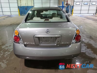 Zdjęcie 6 z 13 samochodu: 2002 NISSAN ALTIMA BASE VIN:1N4AL11E12C701097 - miniatura