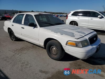 Czwarte zdjęcie samochodu z boku: 2002 FORD CROWN VICTORIA POLICE INTERCEPTOR VIN:2FAFP71W32X130916 - miniatura