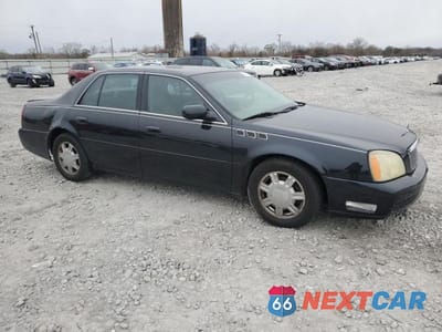 Czwarte zdjęcie samochodu z boku: 2003 CADILLAC DEVILLE VIN:1G6KD54Y03U212407 - miniatura