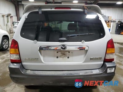 Zdjęcie 6 z 13 samochodu: 2004 MAZDA TRIBUTE VIN:4F2CZ96184KM26214 - miniatura