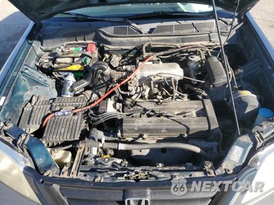 Zdjęcie 12 z 13 samochodu: 1999 HONDA CR-V LX VIN:JHLRD2844XC010900 - miniatura