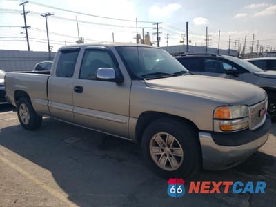 Czwarte zdjęcie samochodu z boku: 2000 GMC NEW SIERRA C1500 VIN:1GTEC19T1YZ181889 - miniatura