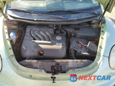 Zdjęcie 12 z 14 samochodu: 2002 VOLKSWAGEN NEW BEETLE GL VIN:3VWBK21C02M403867 - miniatura