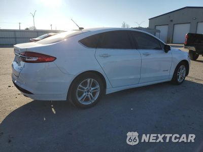Trzecie zdjęcie samochodu z tyłu: 2018 FORD FUSION SE HYBRID VIN:3FA6P0LU3JR216551 - miniatura