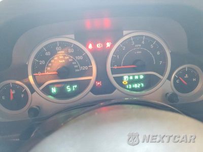 Zdjęcie 9 z 13 samochodu: 2008 JEEP WRANGLER SAHARA VIN:1J4FA54188L601152 - miniatura